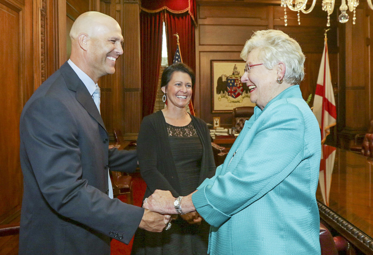 Alabama Gov. Kay Ivey and Tim Hudson